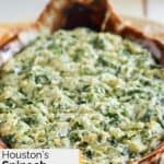 Homemade Houston's spinach and artichoke dip in a ceramic dish.