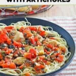 A bowl of homemade Johnny Carino's angel hair pasta with artichokes and tomatoes.