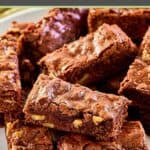 Homemade Kahlua brownies on a large plate.