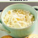 Homemade Kroger Jarlsberg cheese dip in a bowl and crackers beside it.