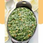Homemade Lawry's creamed spinach in a serving dish and a spoon next to it.