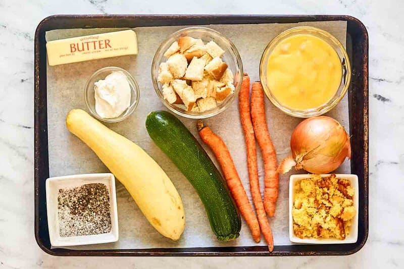 Copycat Luby's squash casserole ingredients on a tray.