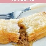Homemade McDonald's apple pie cut in half.