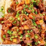 Homemade Panda Express Beijing beef garnished with sliced green onions.