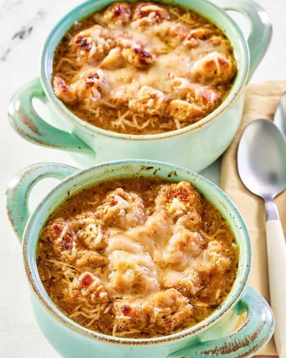 Copycat Panera French onion soup in two bowls.