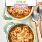 Two bowls of homemade Panera French onion soup and two spoons.