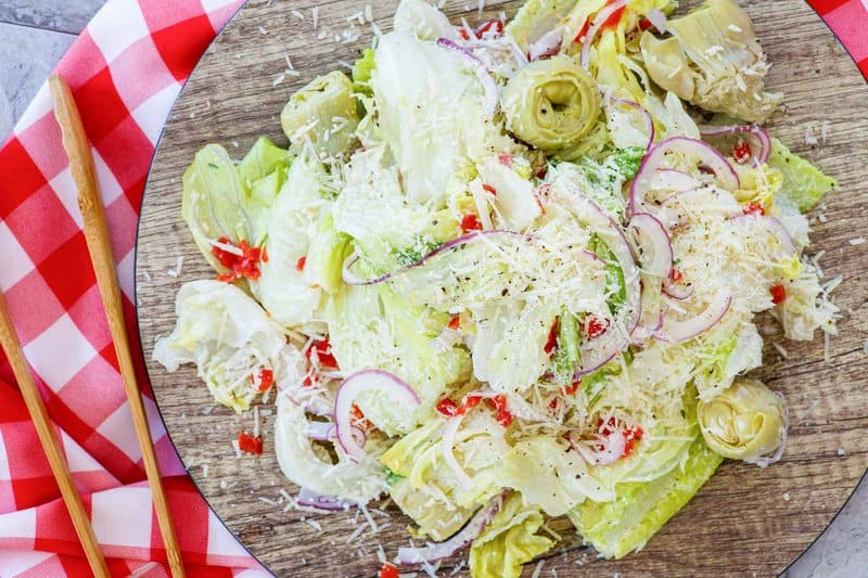 Copycat Pasta House Company salad on a wood board.