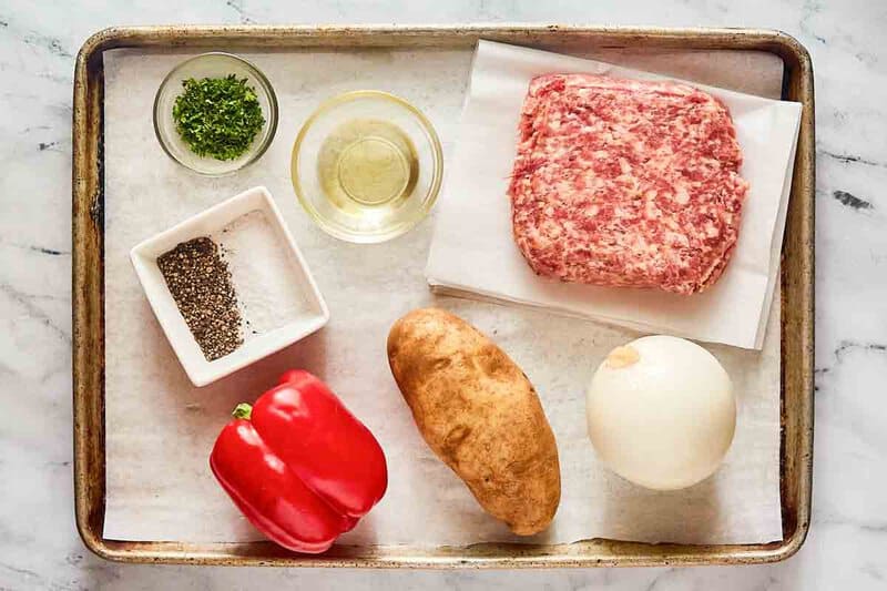 Sausage hash ingredients on a tray.