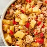 A bowl of sausage potato hash.