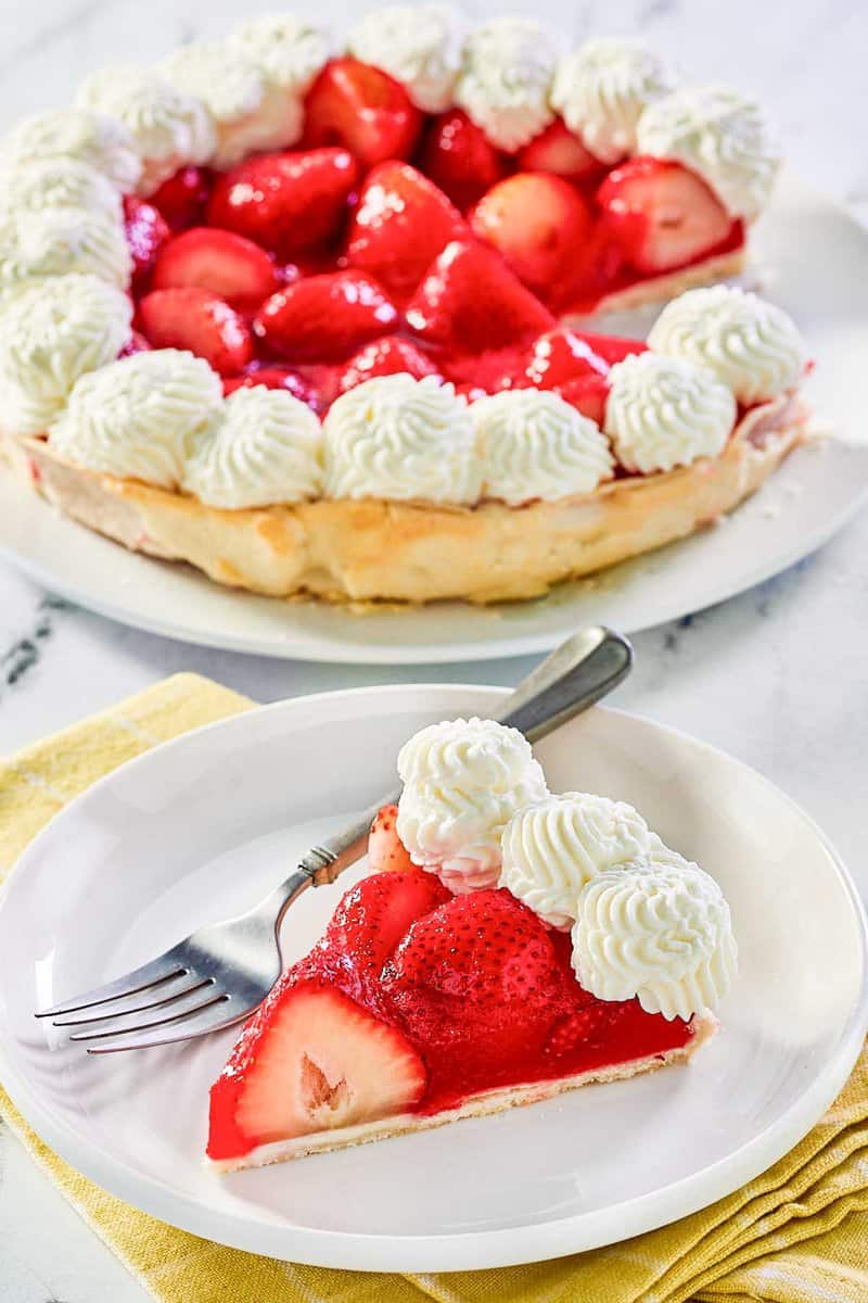 Copycat Shoney's strawberry pie and a slice on a plate.