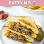 Homemade Waffle House Texas patty melt sandwich and pickles on a plate.