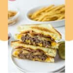 Homemade Waffle House Texas bacon patty melt sandwich halves stacked on a plate.