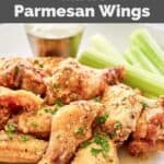 Homemade Wingstop garlic parmesan chicken wings, celery sticks, and dipping sauce.