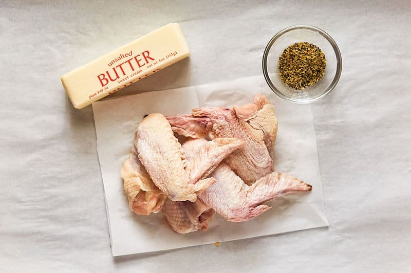 Copycat Wingstop lemon pepper wings ingredients on parchment paper.