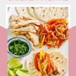 Homemade grilled chicken fajitas on a table.