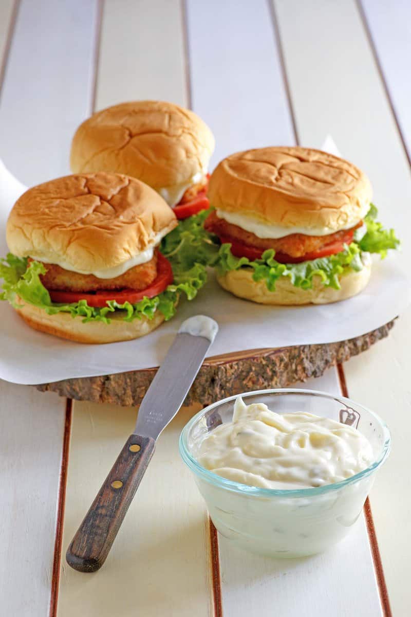 Copycat McDonald's tartar sauce and three fish sandwiches.