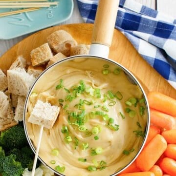 Copycat Melting Pot Wisconsin trio cheese fondue and assorted dippers.