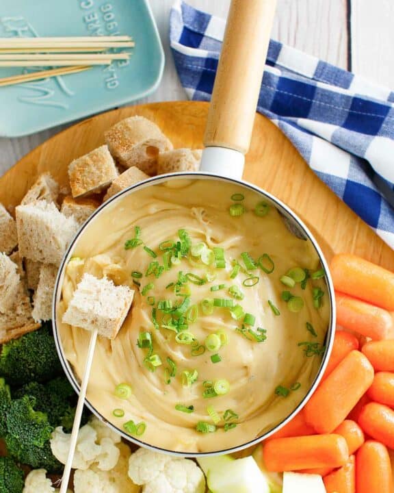 Copycat Melting Pot Wisconsin trio cheese fondue and assorted dippers.