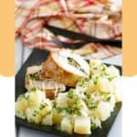 Parsley potatoes and stuffed pork loin on a plate.