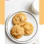 Three snickerdoodle cookies on a plate.
