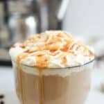 Homemade Starbucks caramel latte in a coffee cup.