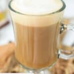 Homemade Starbucks vanilla latte on a wood board.