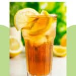 A glass of homemade sweet iced tea garnished with lemons.