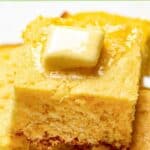 Homemade Tippin's cornbread with a pat of butter on top.
