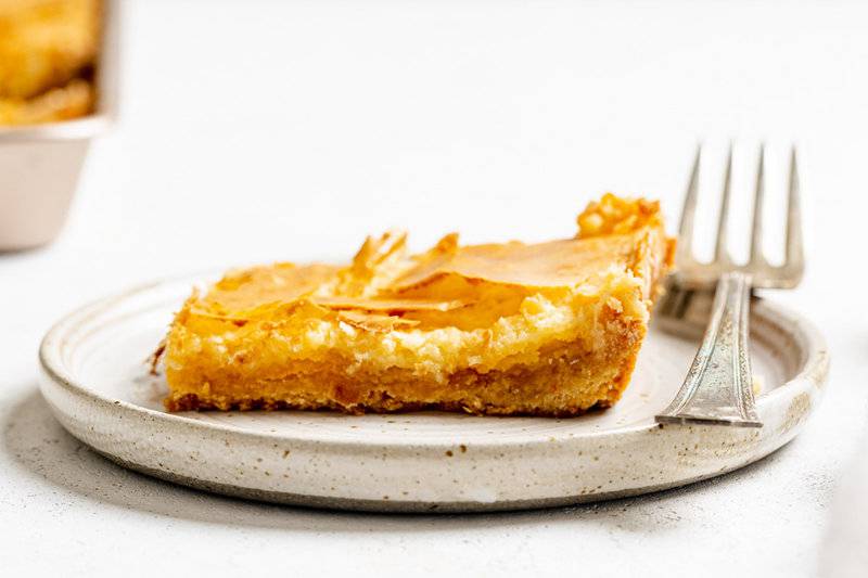Copycat Treebeards butter cake slice and a fork on a plate.