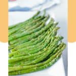 Air fried asparagus spears on a platter.