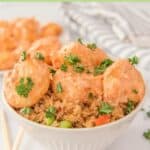 Air fryer bang bang shrimp and fried rice in a bowl.