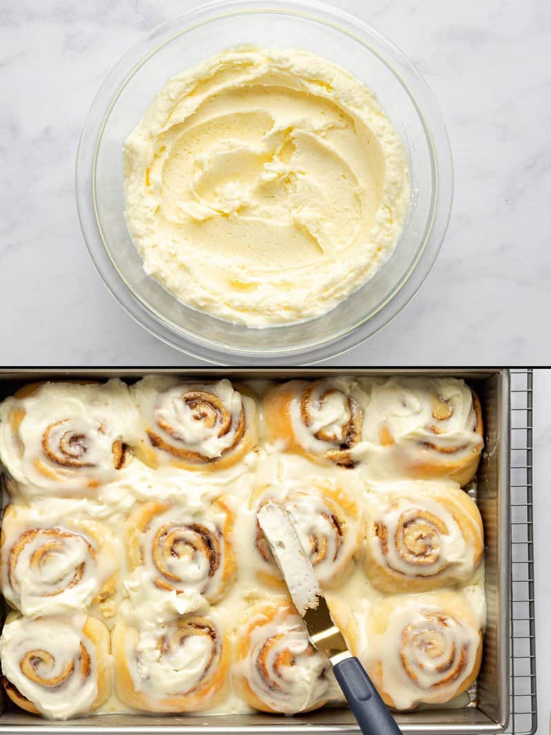 Cream cheese frosting in a bowl and being spread on cinnamon rolls.