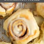 Homemade Cinnabon cinnamon roll in a baking pan.