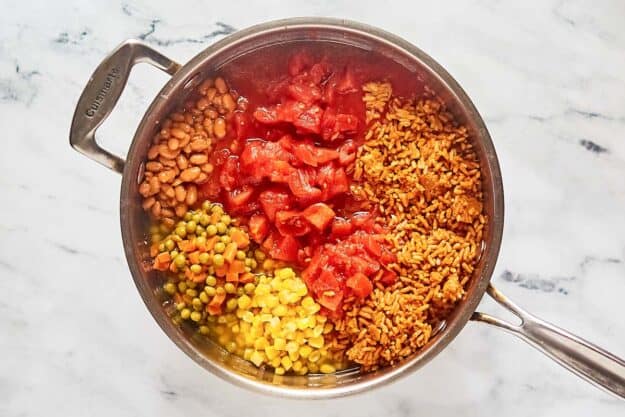 Cowboy soup ingredients in a pan.