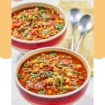 Two bowls of cowboy soup and two spoons.