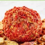 French onion cheese ball and crackers around it.