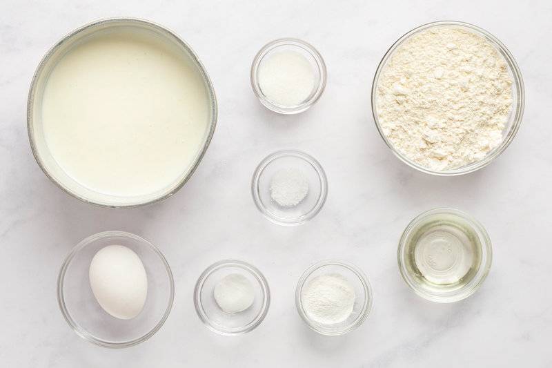 Copycat IHOP buttermilk pancakes ingredients in bowls.