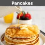 A stack of homemade IHOP buttermilk pancakes with butter and syrup.
