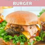 Homemade In-N-Out animal style burger on a wood serving board.