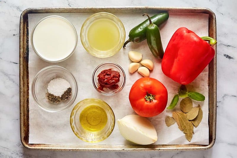 Copycat La Madeleine red pepper soup ingredients on a tray.
