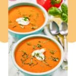 Two bowls of homemade La Madeleine red pepper soup.