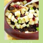 A bowl of fruit and maple oatmeal.