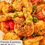 Homemade chili crisp shrimp garnished with green onions.