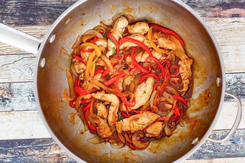 Copycat Panda Express firecracker chicken in a skillet.