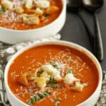 Two bowls of copycat Panera tomato soup.