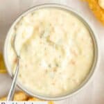 Homemade Red Lobster tartar sauce and a spoon in a small bowl.