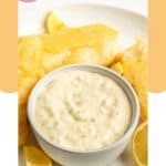 A bowl of homemade Red Lobster tartar sauce and fried fish on a plate.