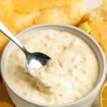 Homemade Red Lobster tartar sauce in a bowl and on a spoon.