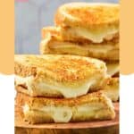 Homemade Starbucks grilled cheese sandwiches cut in half.