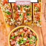 Homemade Applebee's pico de gallo in a small bowl and on top of tacos.
